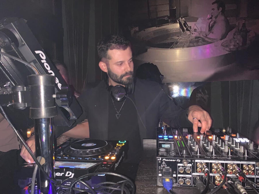 Mascari behind the decks