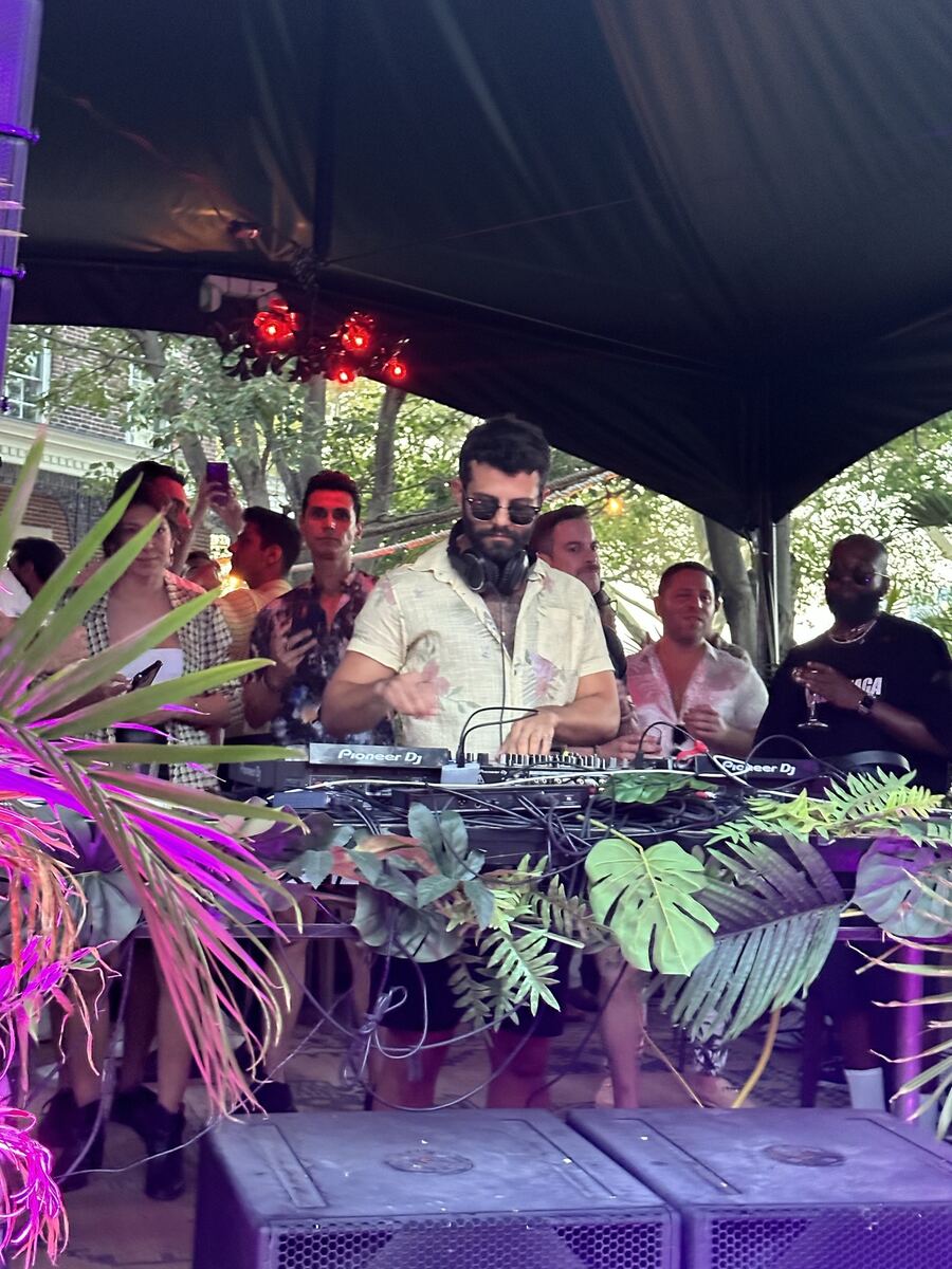 Mascari performing at an outdoor day party